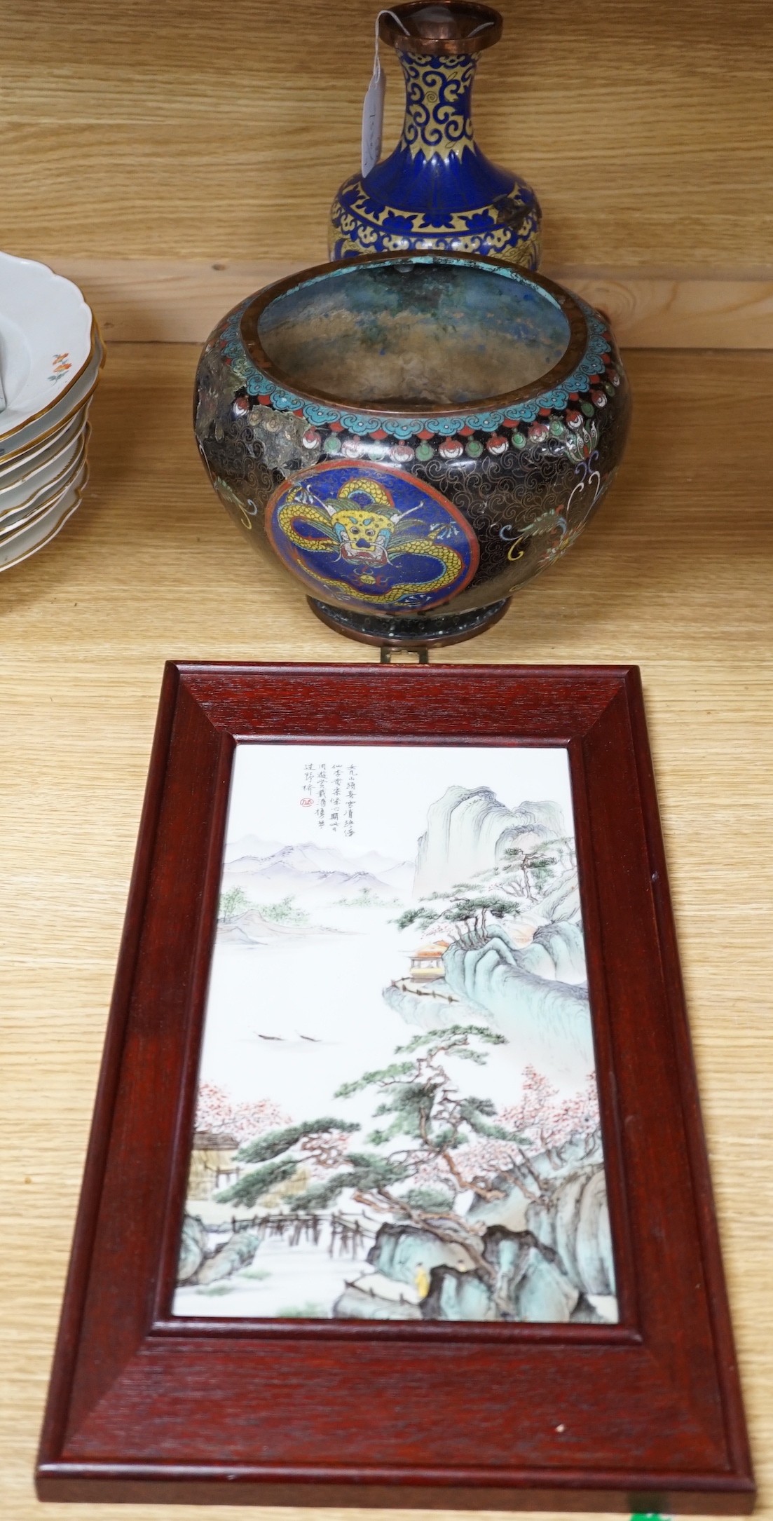 A Chinese framed ceramic plaque, a Chinese cloisonné enamel vase and bowl, plaque 30cms high x 15cms wide